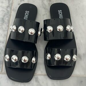 Schutz slides size 7 black with silver metal detail